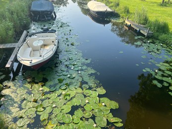 Picturesque view of canal with moored boats