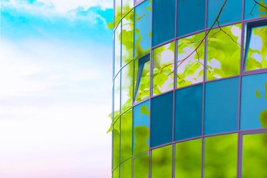 Image of Environment. Modern building and tree, double exposure