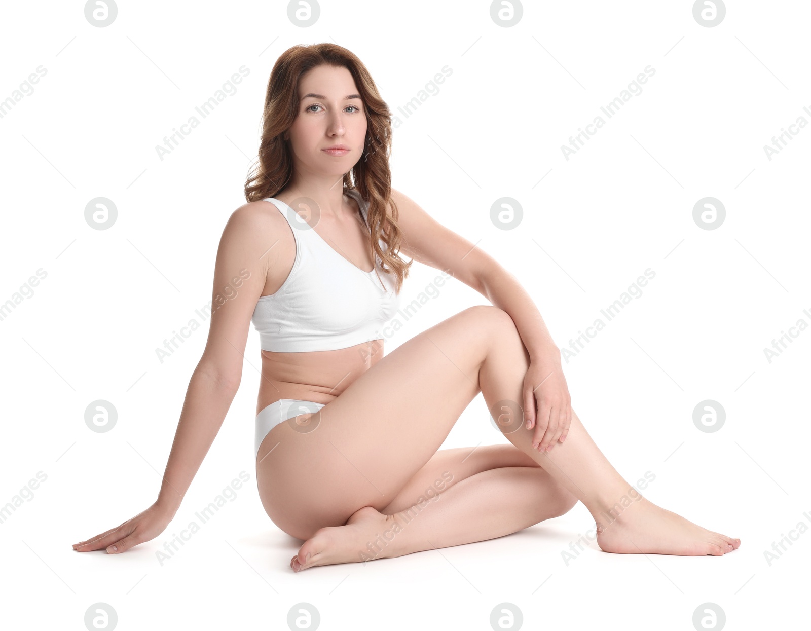 Photo of Woman with slim body posing on white background