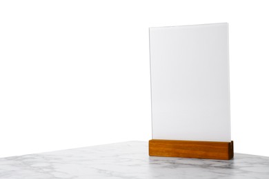 Photo of Menu holder on light marble table against white background. Space for text