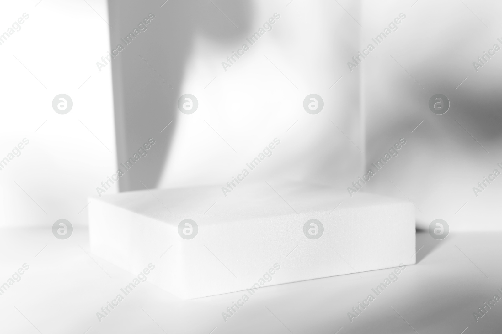 Photo of Presentation of product. Podium on white background, space for text