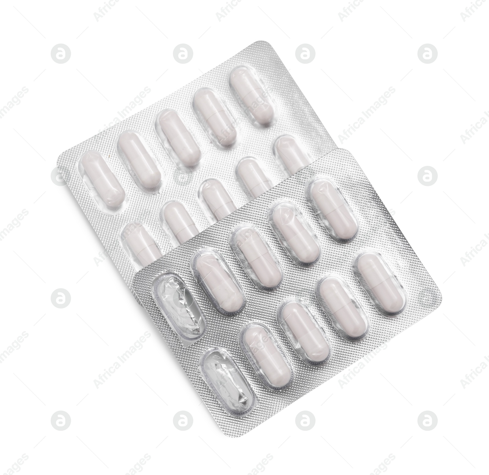 Photo of Antibiotic pills in blisters isolated on white, top view