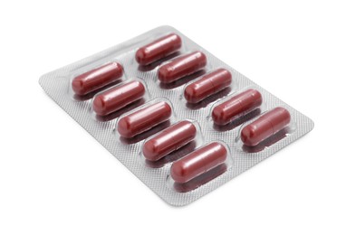 Photo of Antibiotic pills in blister isolated on white