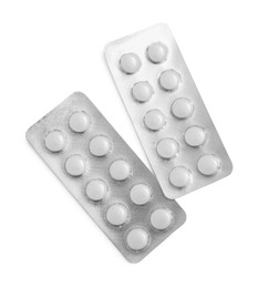 Antibiotic pills in blisters isolated on white, top view