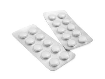 Photo of Antibiotic pills in blisters isolated on white