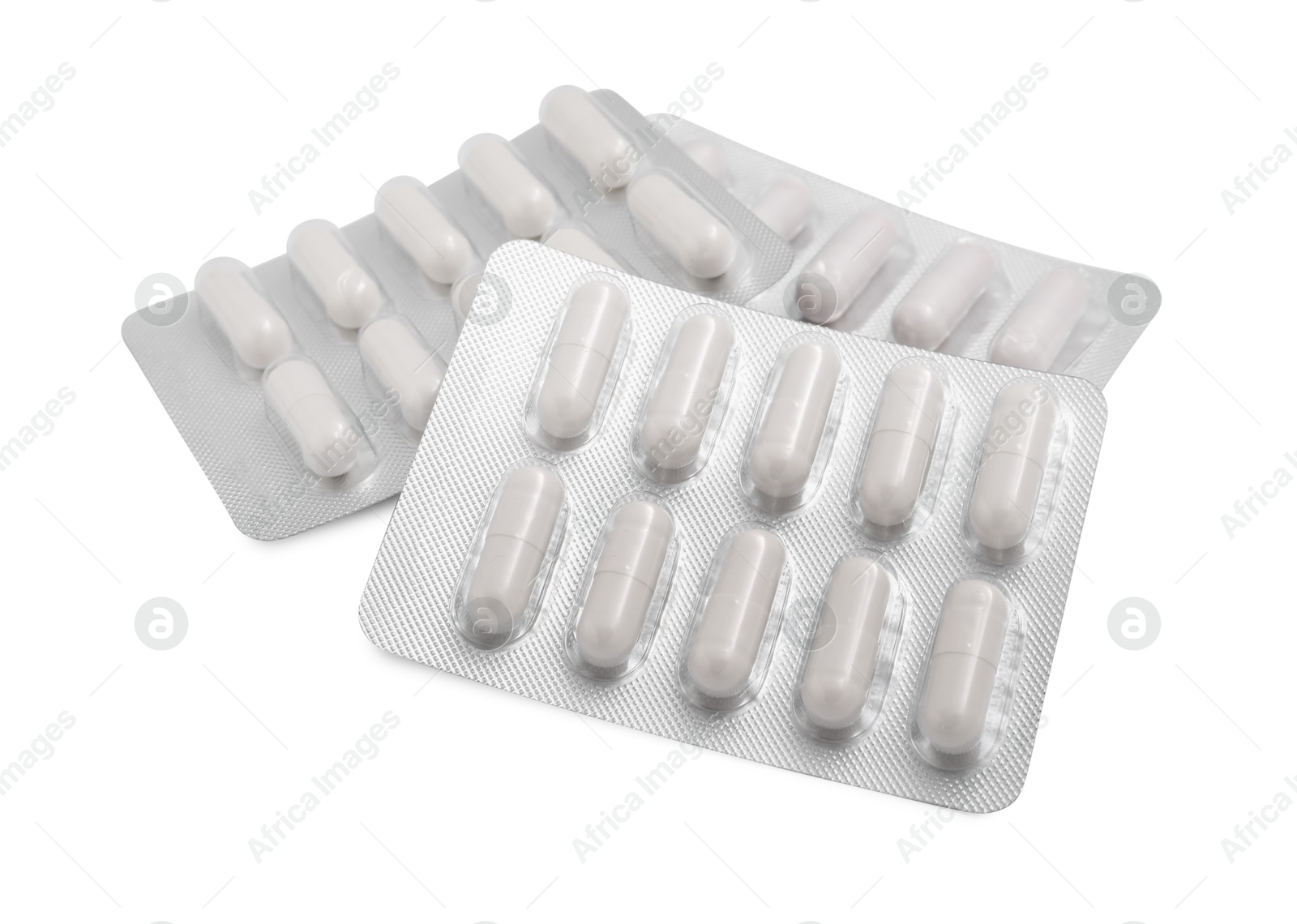 Photo of Antibiotic pills in blisters isolated on white