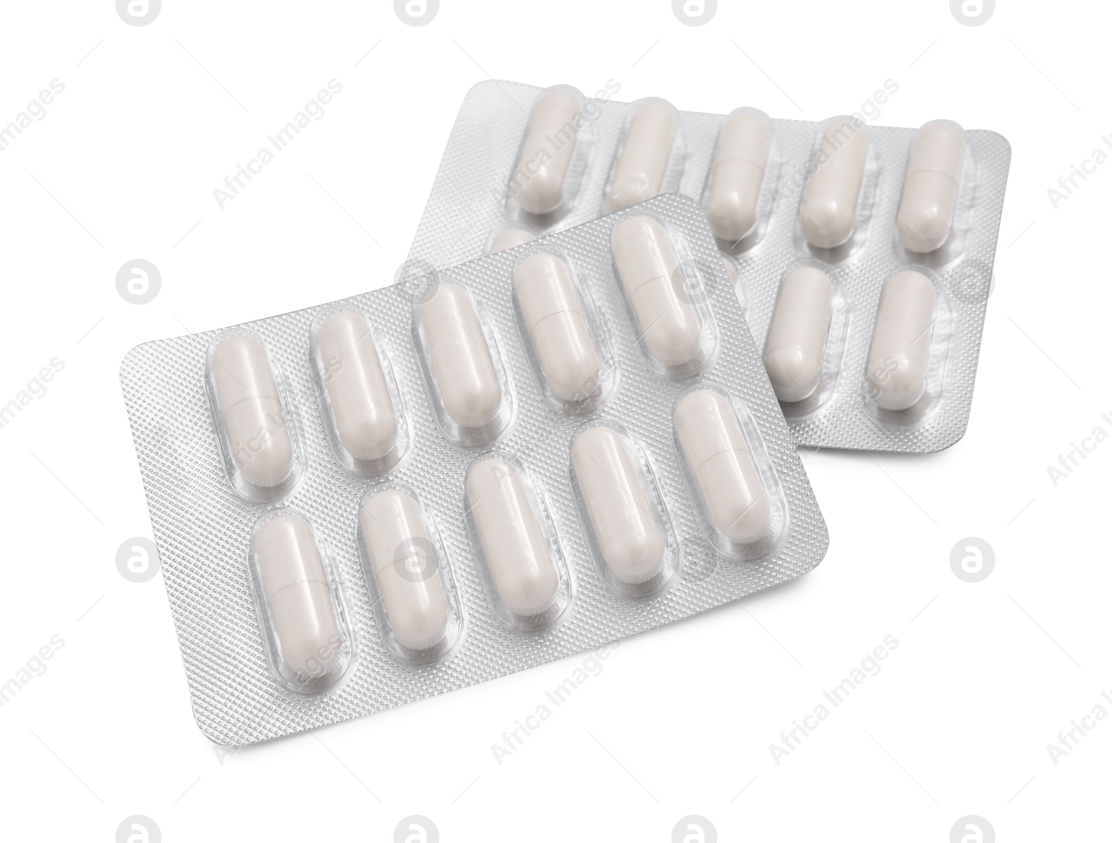 Photo of Antibiotic pills in blisters isolated on white