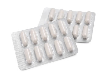 Antibiotic pills in blisters isolated on white