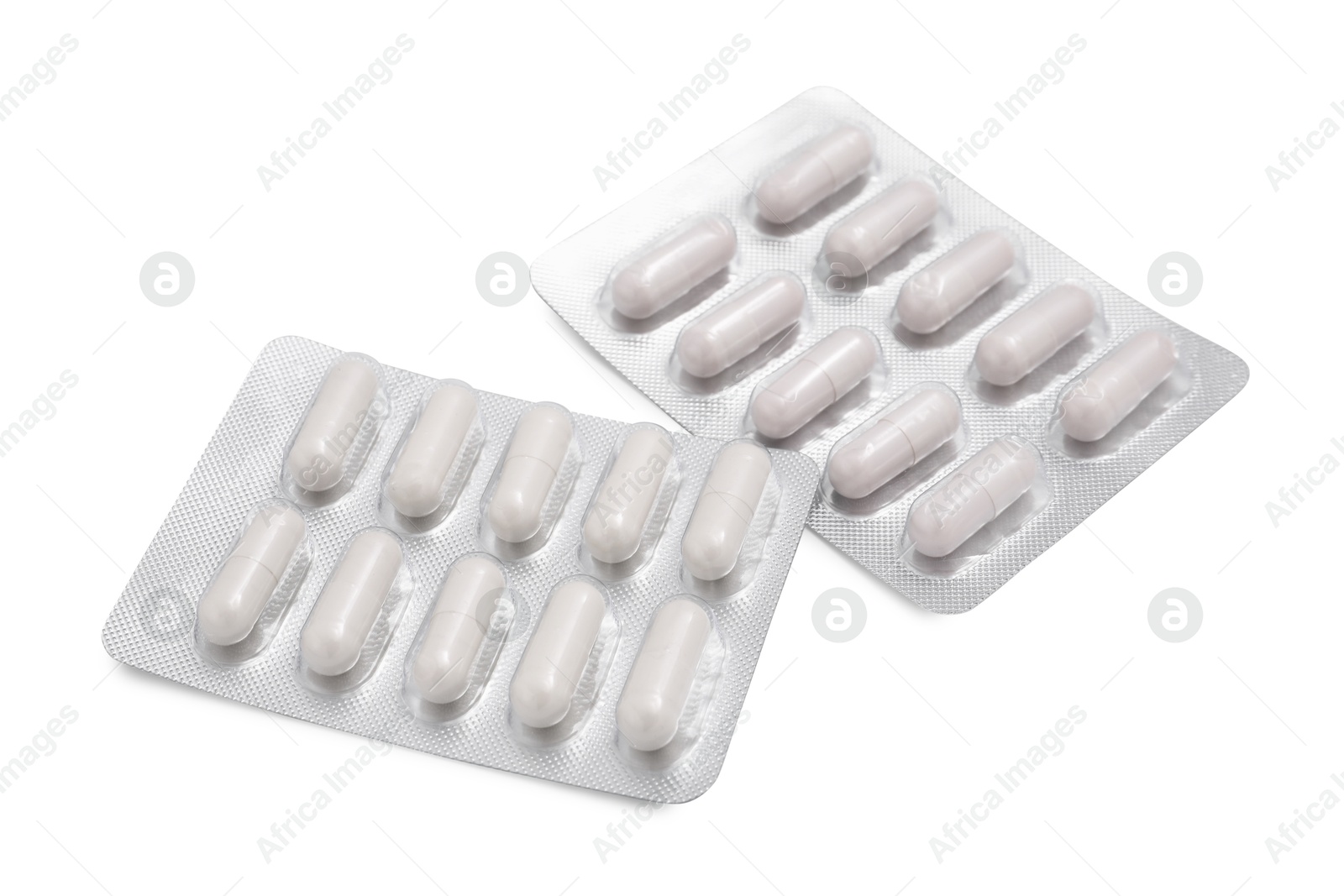 Photo of Antibiotic pills in blisters isolated on white