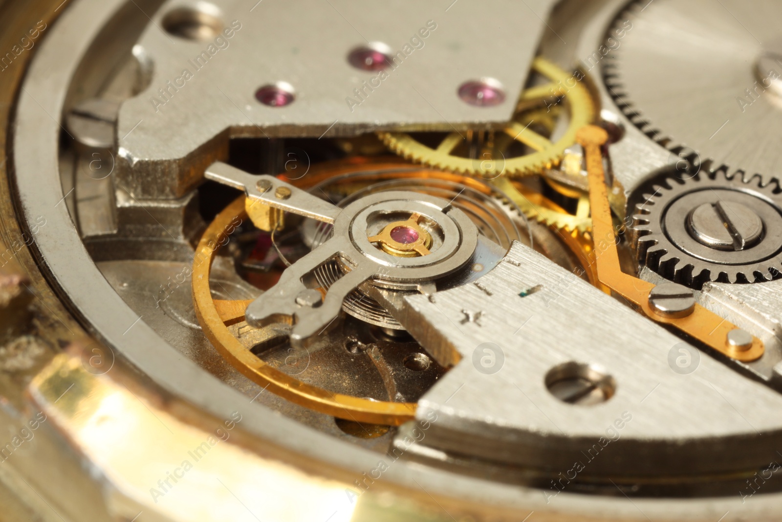 Photo of Mechanism of vintage wrist watch as background, closeup