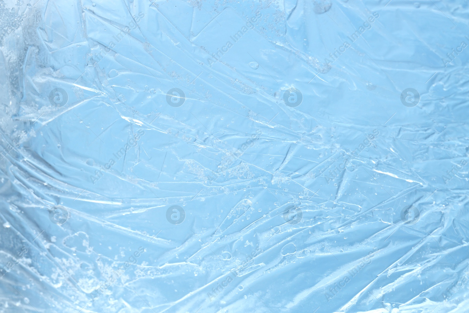 Photo of Beautiful clear ice as background, closeup view