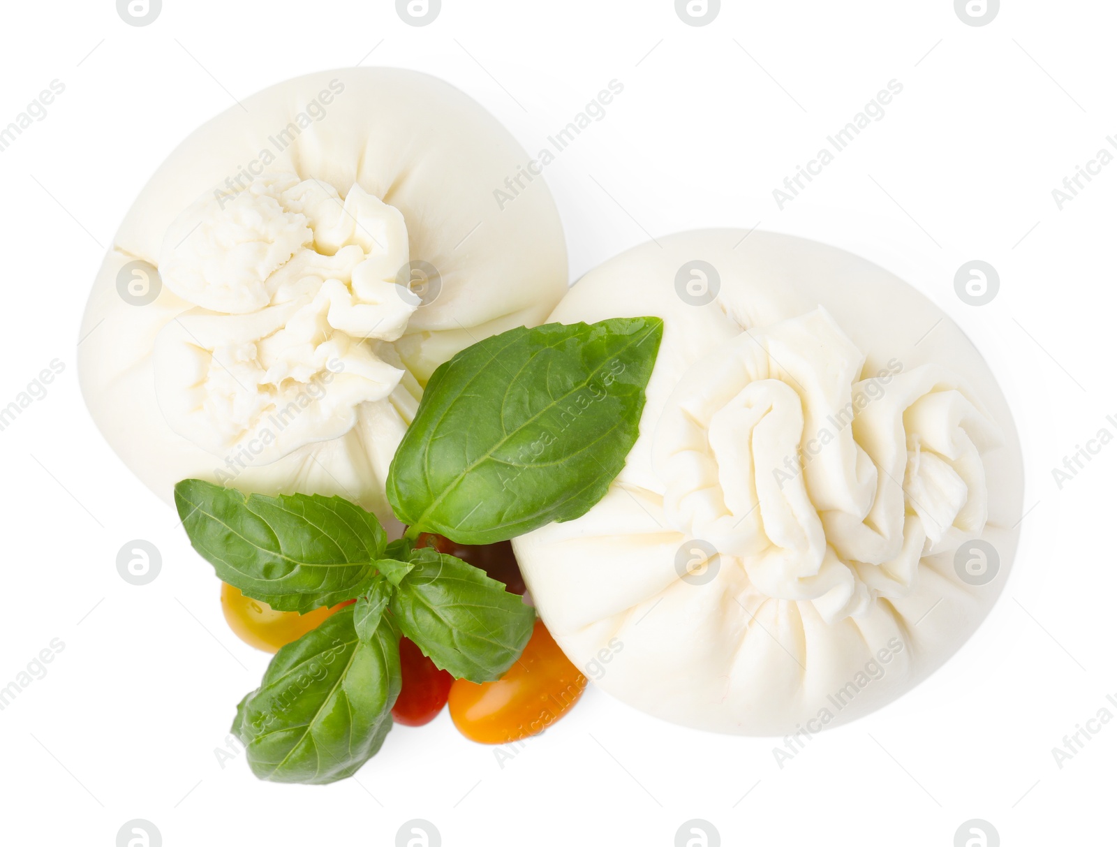 Photo of Fresh delicious burrata cheese, tomatoes and basil isolated on white, top view