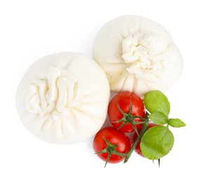 Photo of Fresh delicious burrata cheese, tomatoes and basil isolated on white, top view