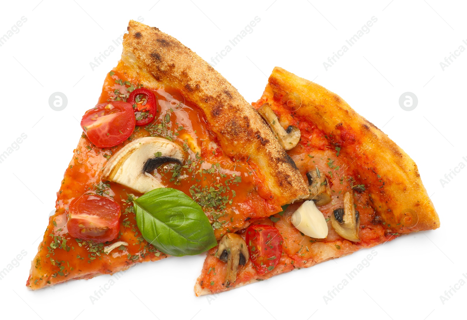 Photo of Pieces of tasty pizza with basil, mushroom, chili pepper and tomato isolated on white, top view