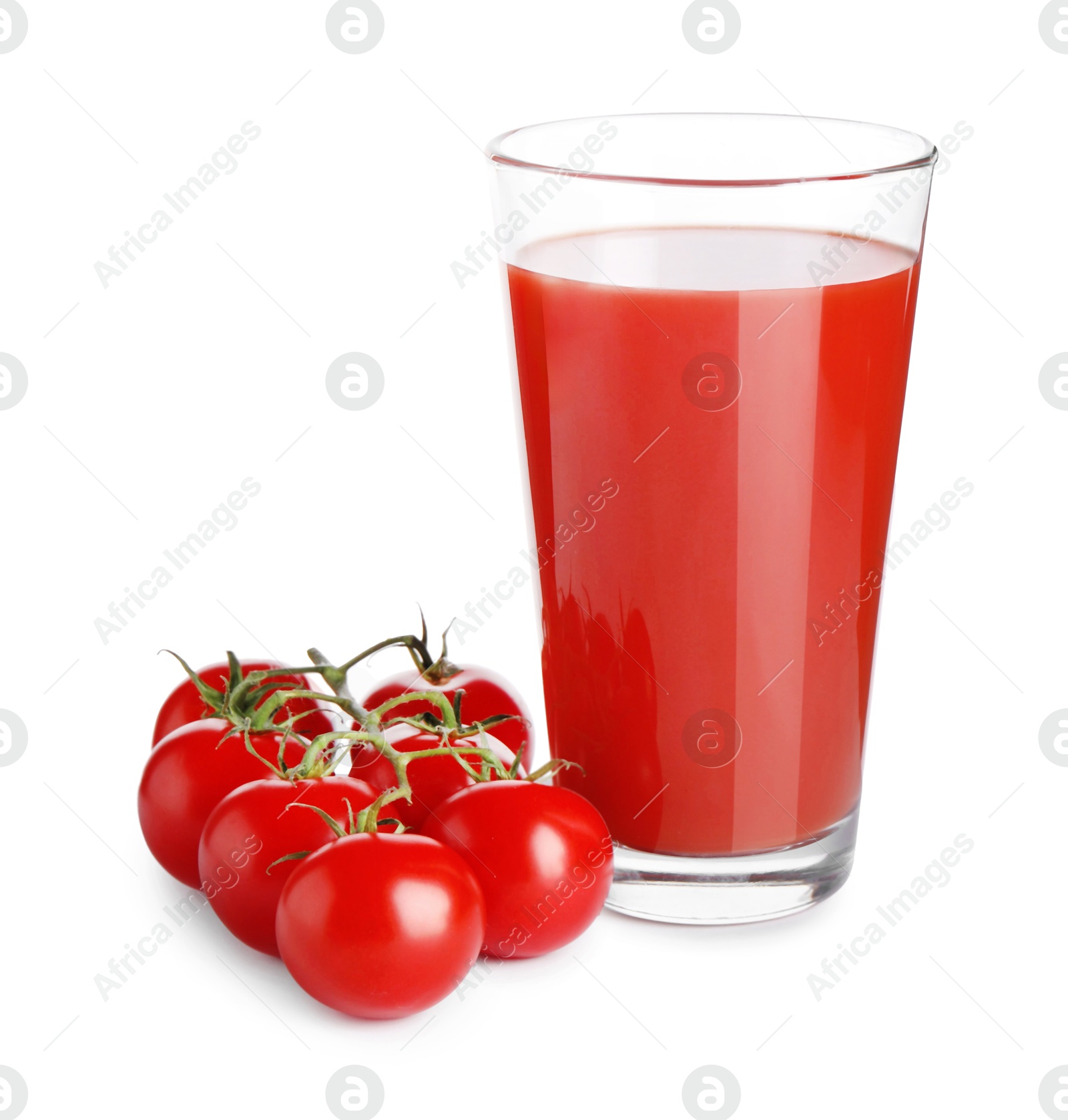 Photo of Tasty tomato juice in glass and fresh vegetables isolated on white