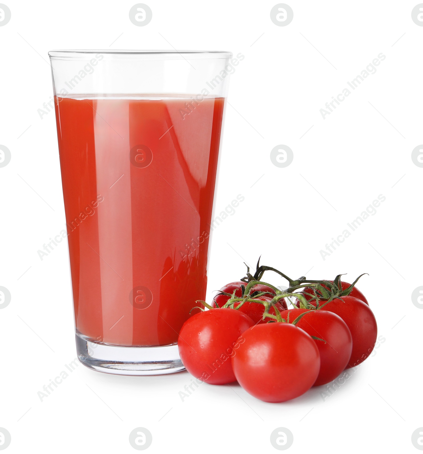 Photo of Tasty tomato juice in glass and fresh vegetables isolated on white