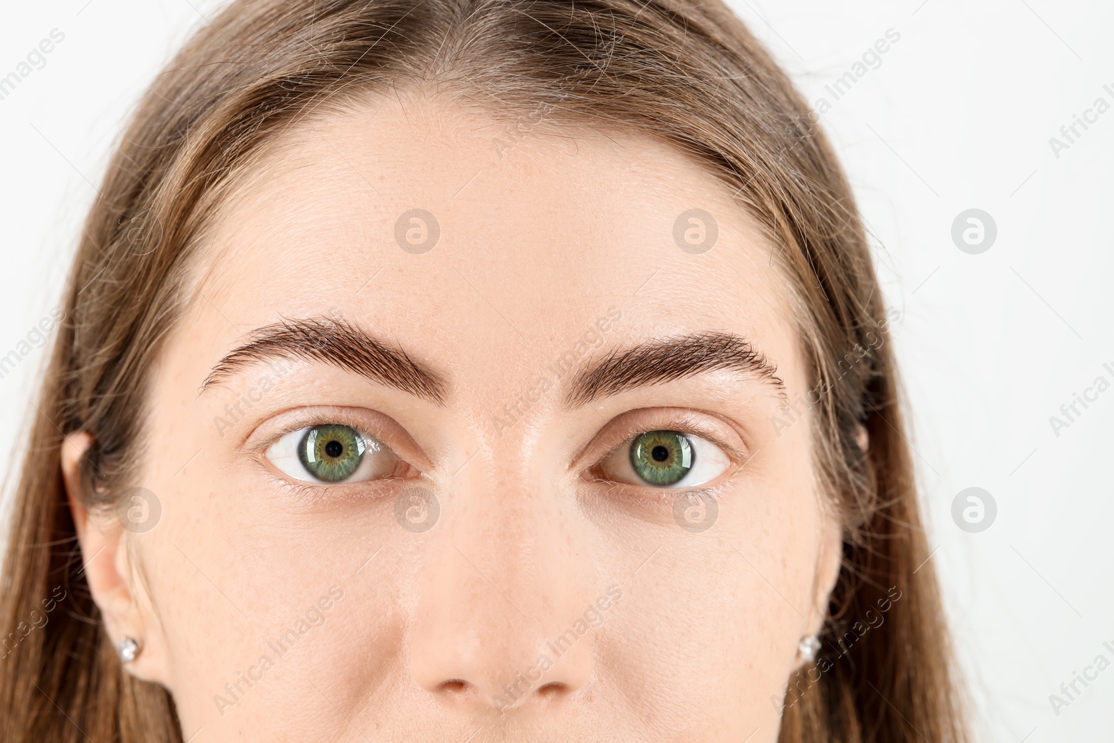 Photo of Closeup view of woman with beautiful eyes on white background