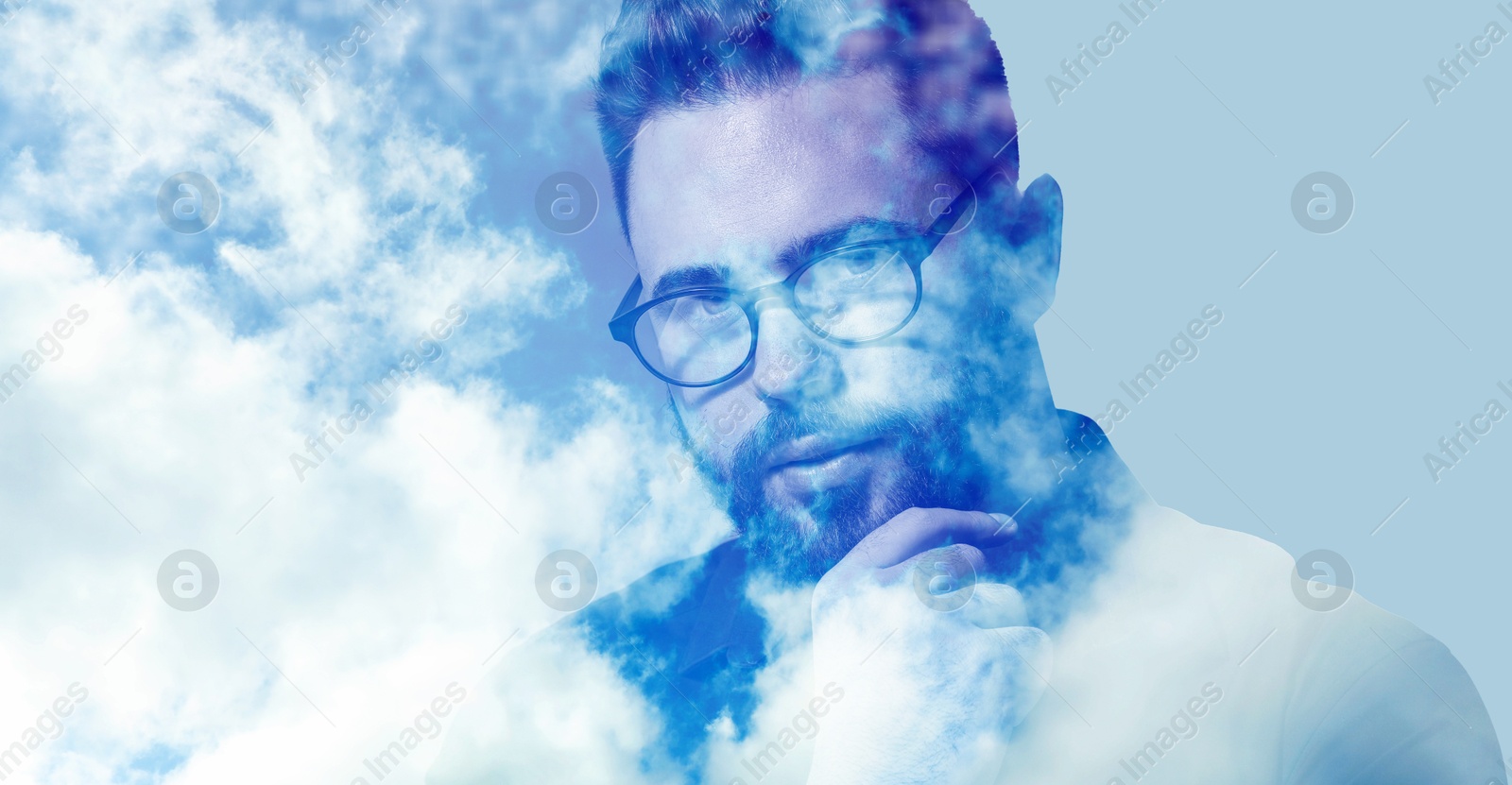 Image of Thoughtful man and beautiful sky with clouds, double exposure