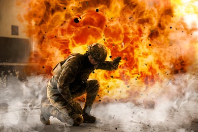 Image of Soldier covering himself from explosion during military operation