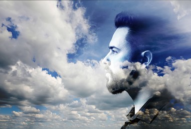 Image of Thoughtful man and beautiful sky with clouds, double exposure