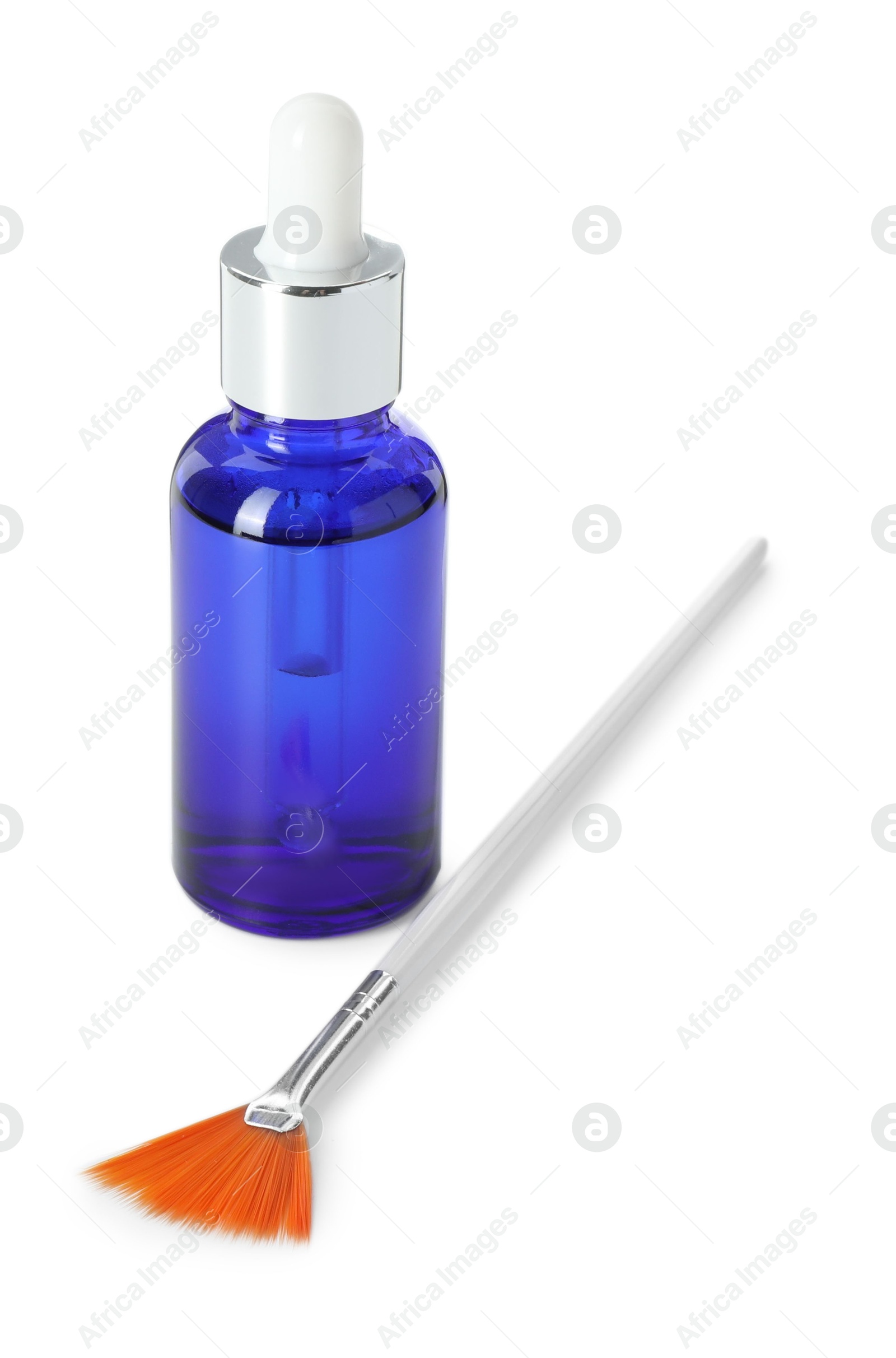 Photo of Bottle of chemical peel and brush isolated on white. Peeling procedure