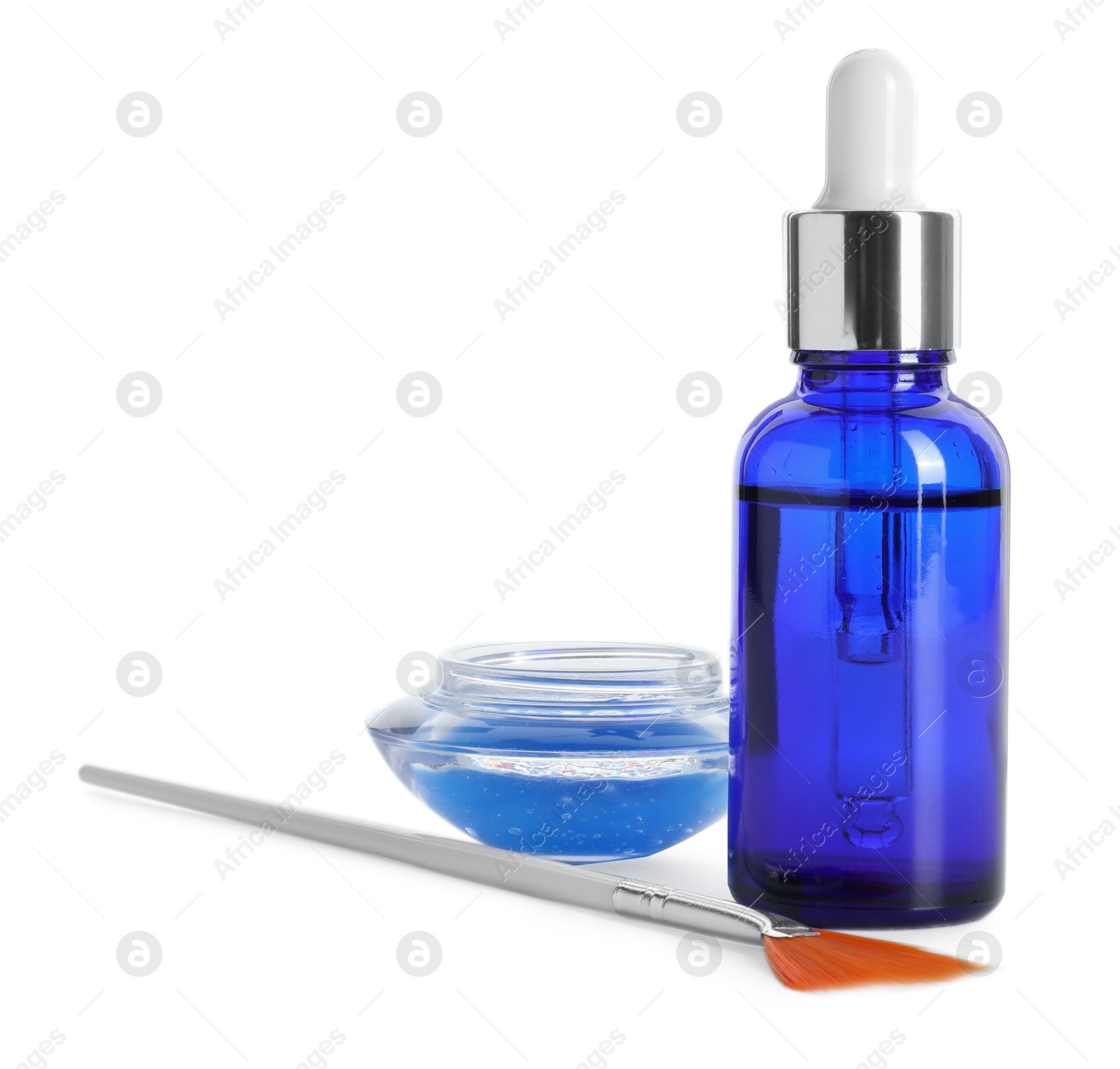 Photo of Bottle of chemical peel, bowl with liquid and brush isolated on white. Peeling procedure