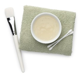 Photo of Bowl of chemical peel, towel, ear sticks and brush isolated on white, top view. Peeling procedure