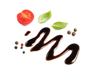 Delicious balsamic vinegar, tomato, basil and peppercorns isolated on white