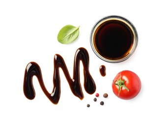 Photo of Delicious balsamic vinegar, tomato, basil and peppercorns isolated on white, top view