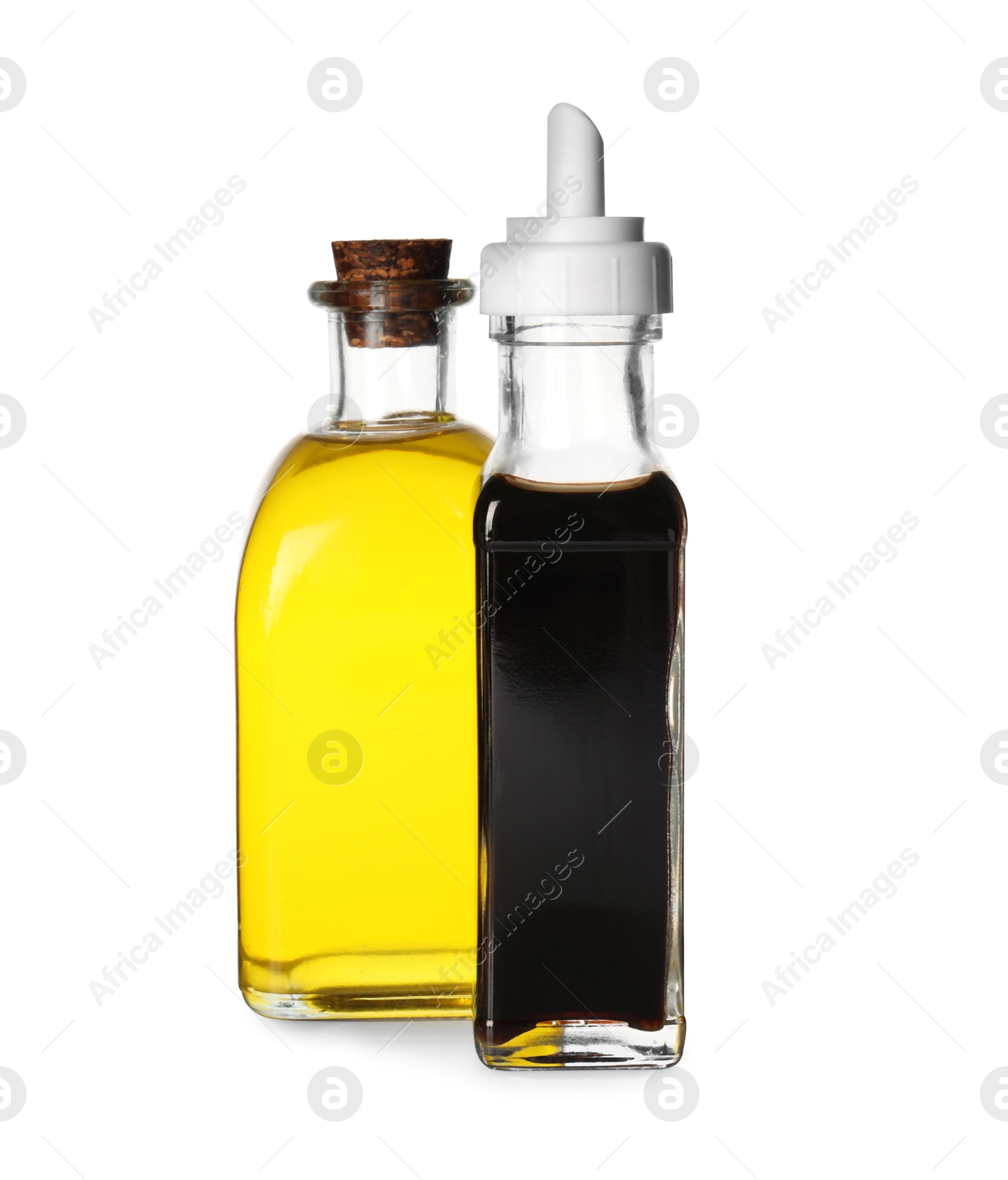 Photo of Balsamic vinegar in bottle and oil isolated on white