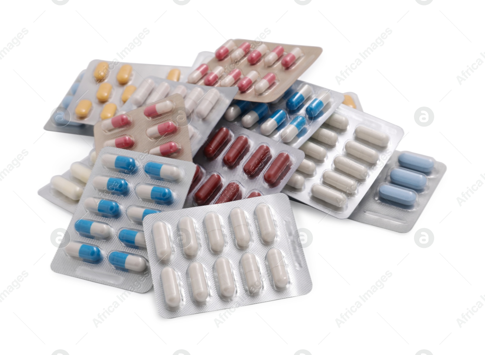 Photo of Different antibiotic pills in blisters isolated on white