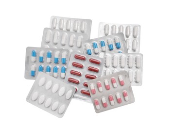 Different antibiotic pills isolated white, top view