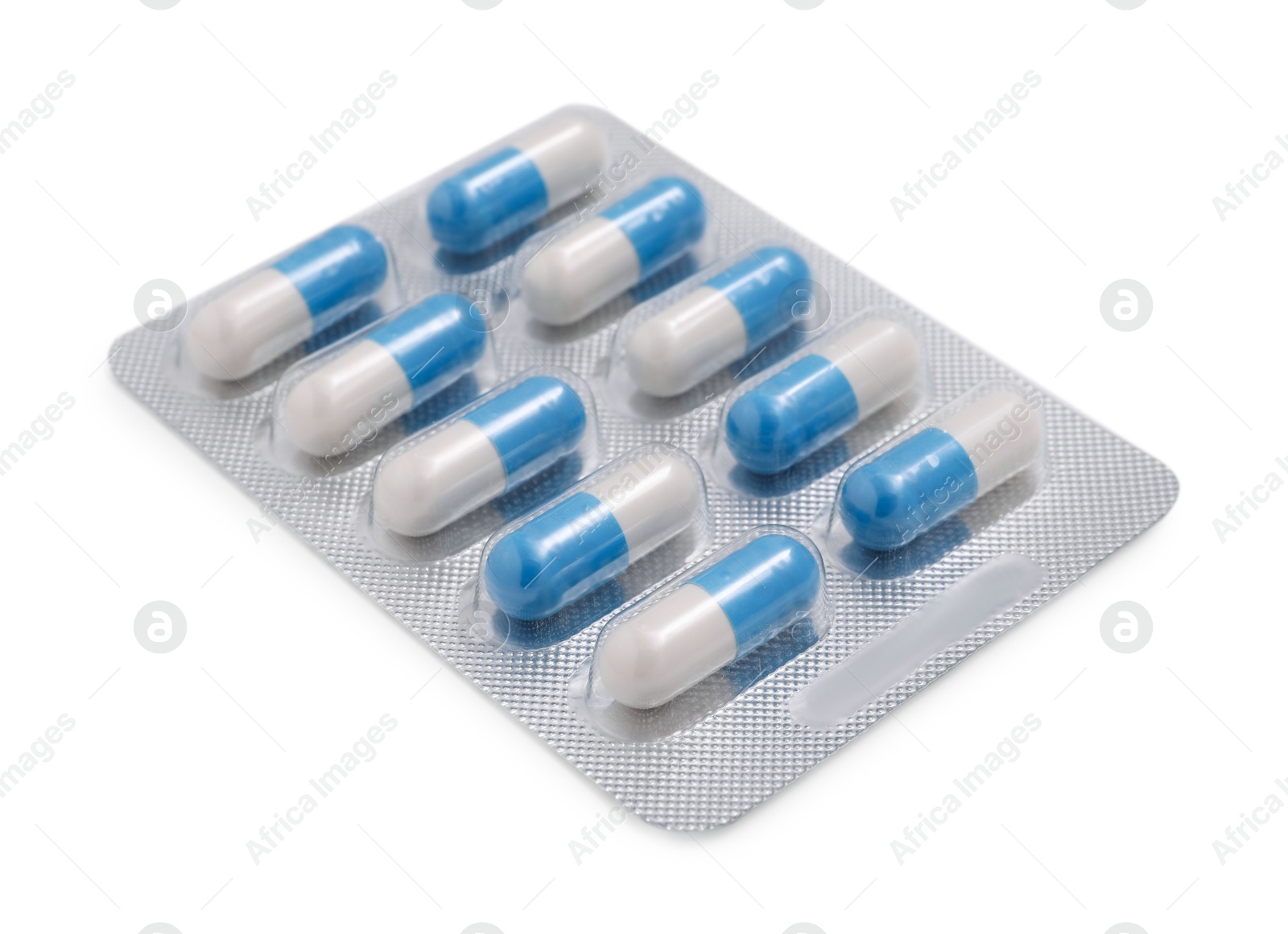 Photo of Antibiotic pills in blister isolated on white