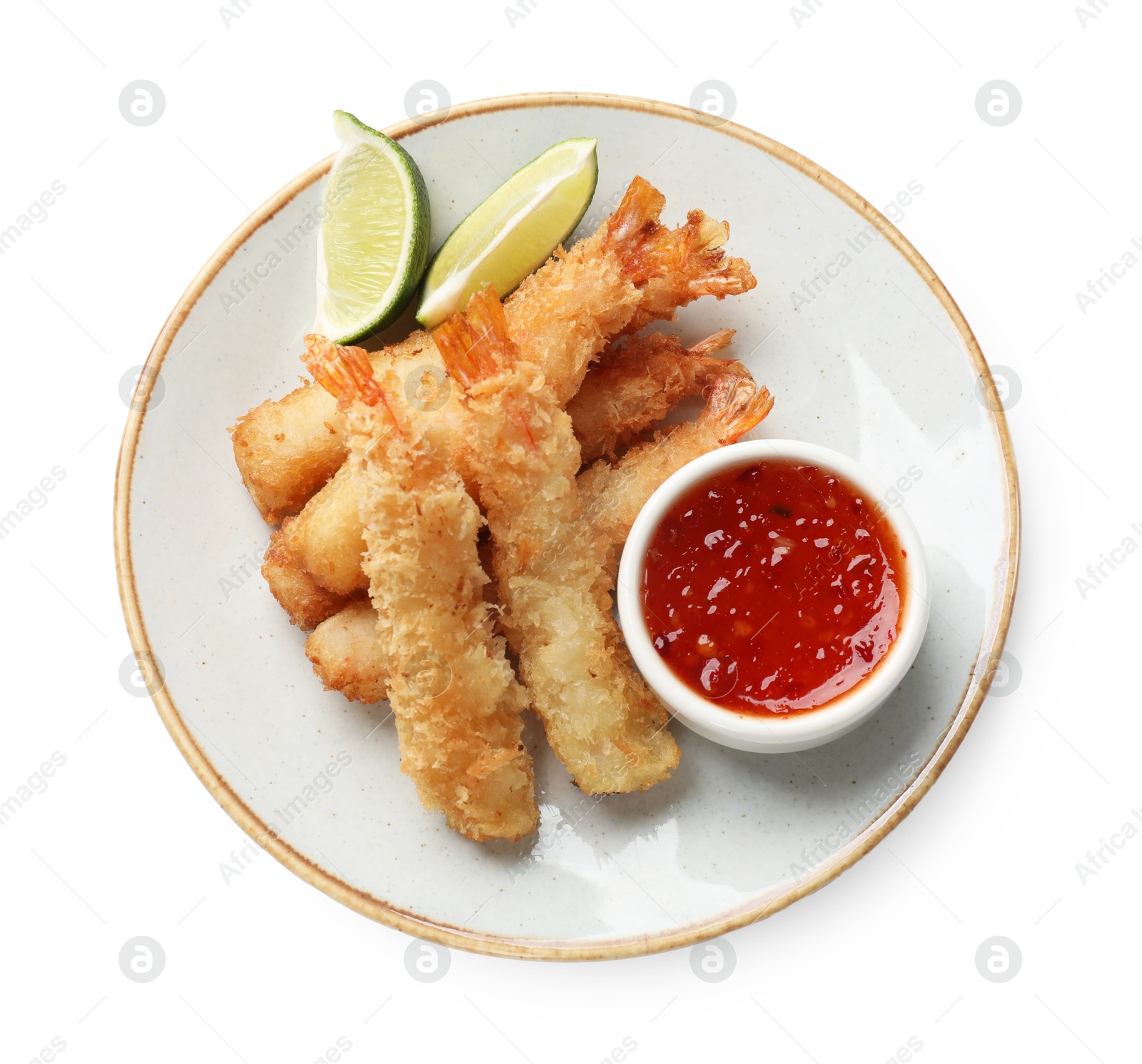 Photo of Delicious breaded fried shrimps with sauce isolated on white, top view