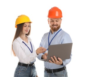 Photo of Engineers in hard hats with laptop on white background
