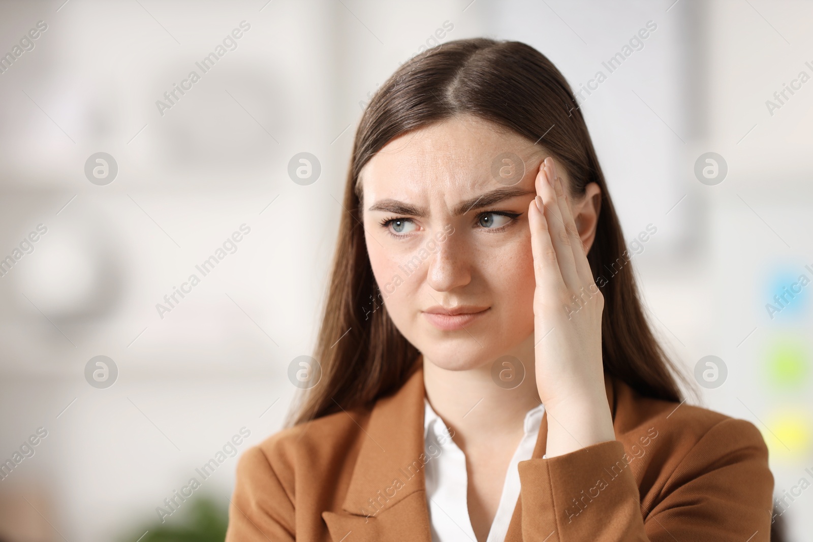 Photo of Embarrassed woman in office, space for text