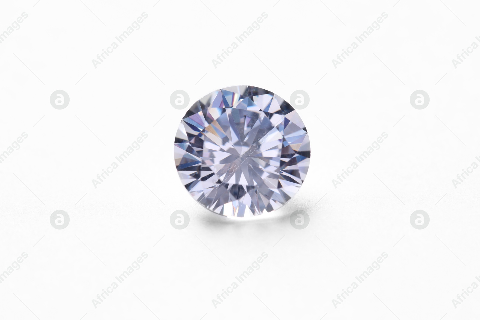 Photo of One beautiful shiny diamond on white background, closeup