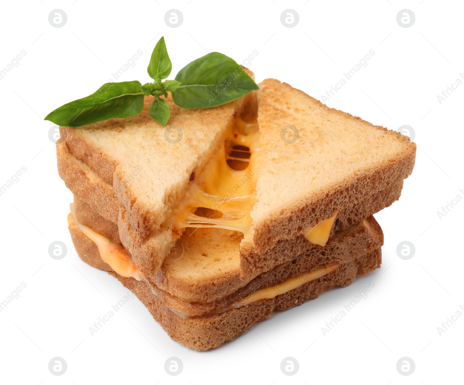 Photo of Pieces of toasted bread with melted cheese and basil isolated on white