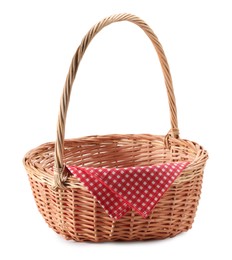 One picnic wicker basket with checkered napkin isolated on white