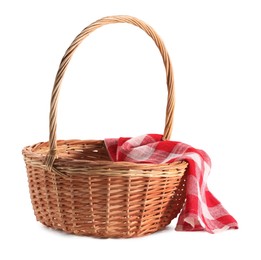 Photo of One picnic wicker basket with checkered napkin isolated on white