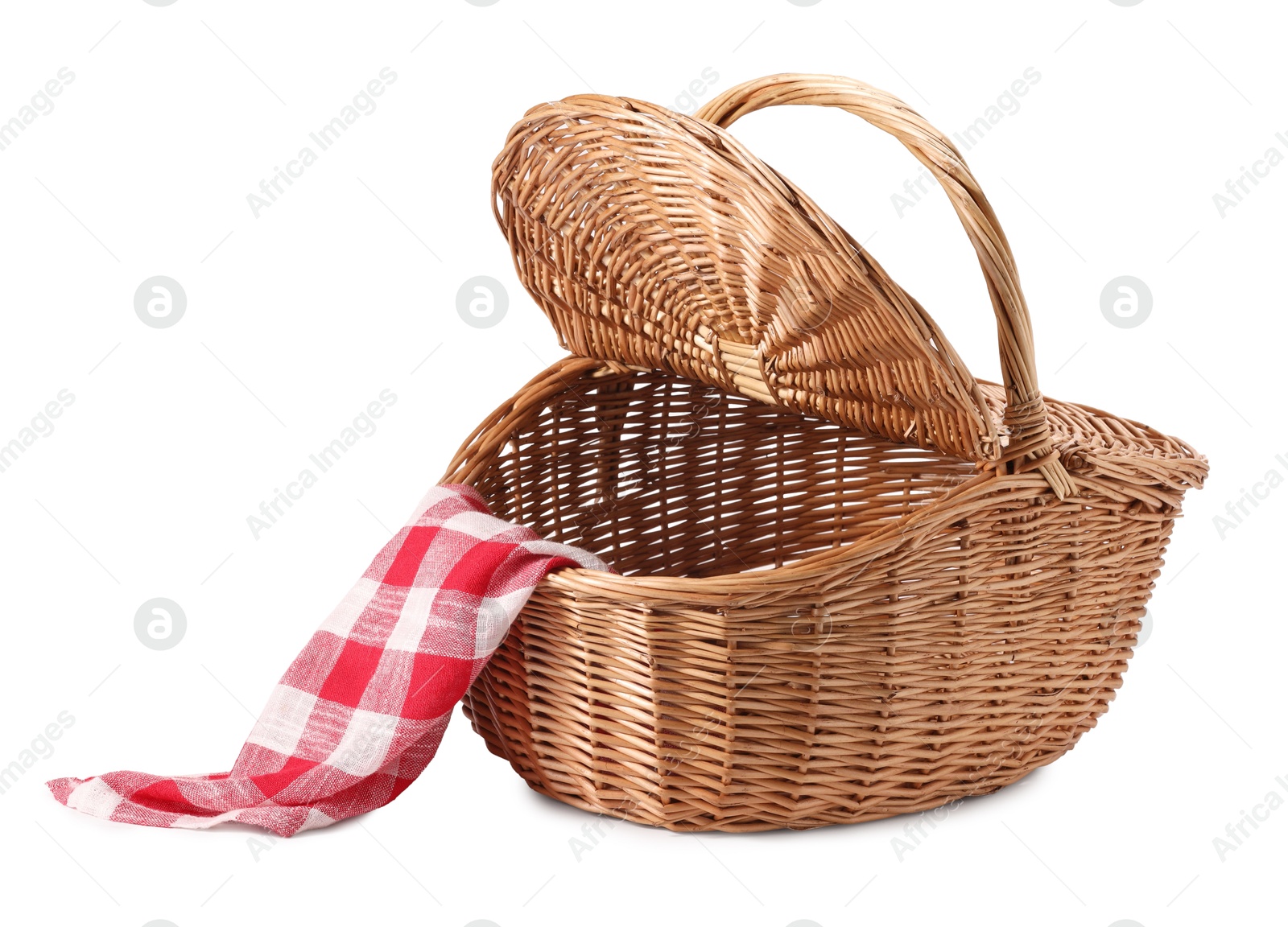 Photo of One open picnic wicker basket with checkered napkin isolated on white