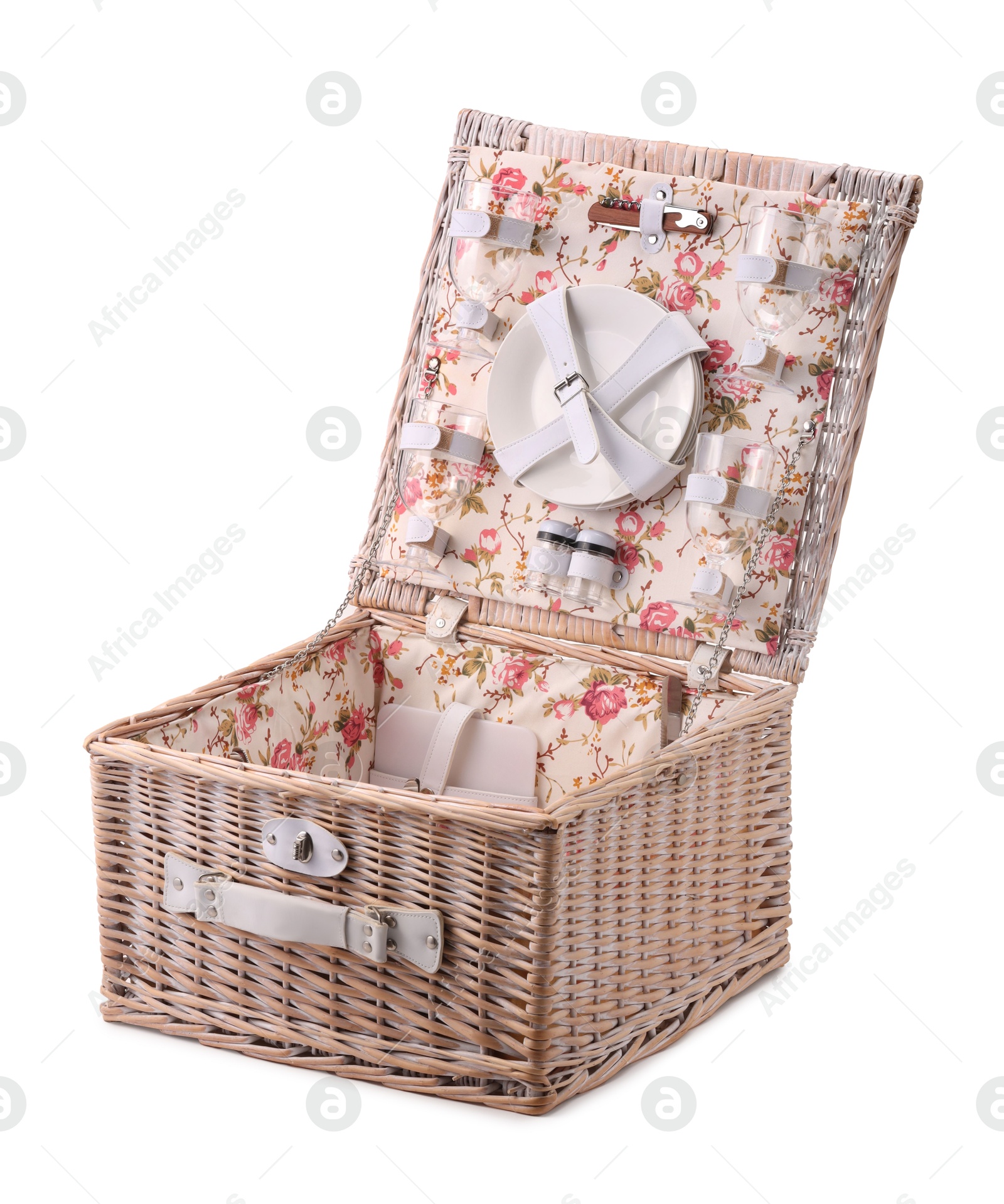 Photo of One open picnic basket with tableware isolated on white