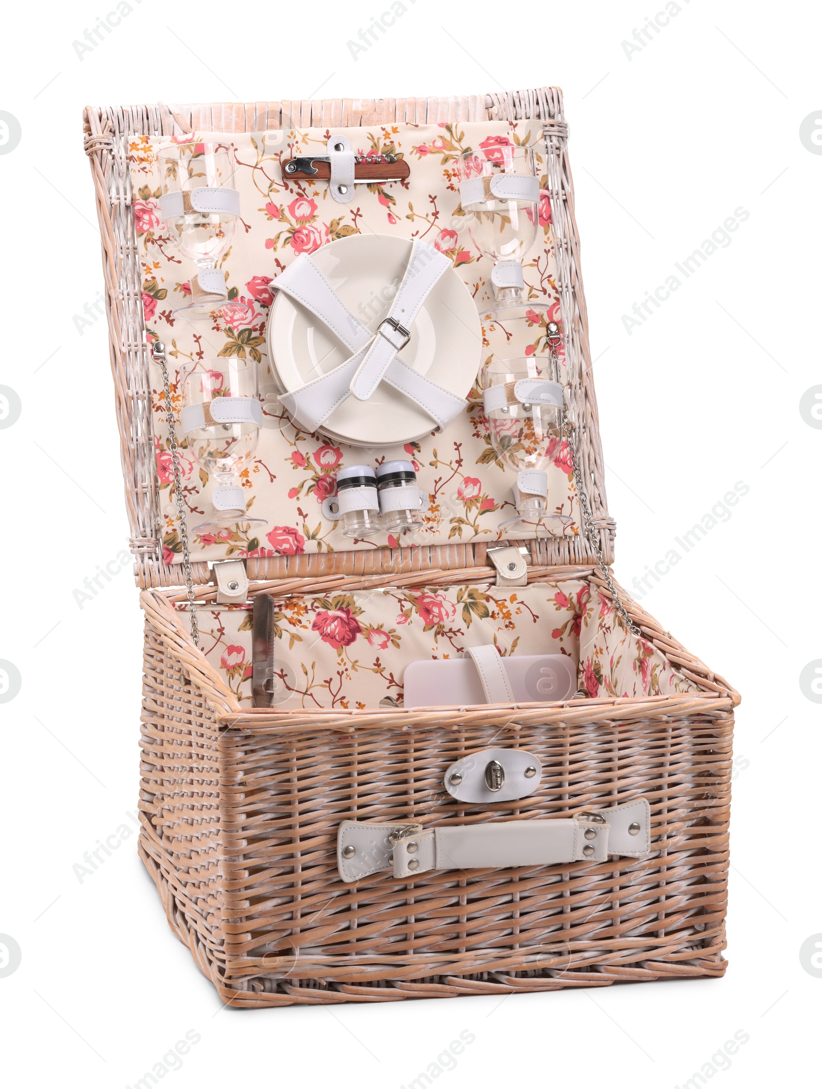 Photo of One open picnic basket with tableware isolated on white