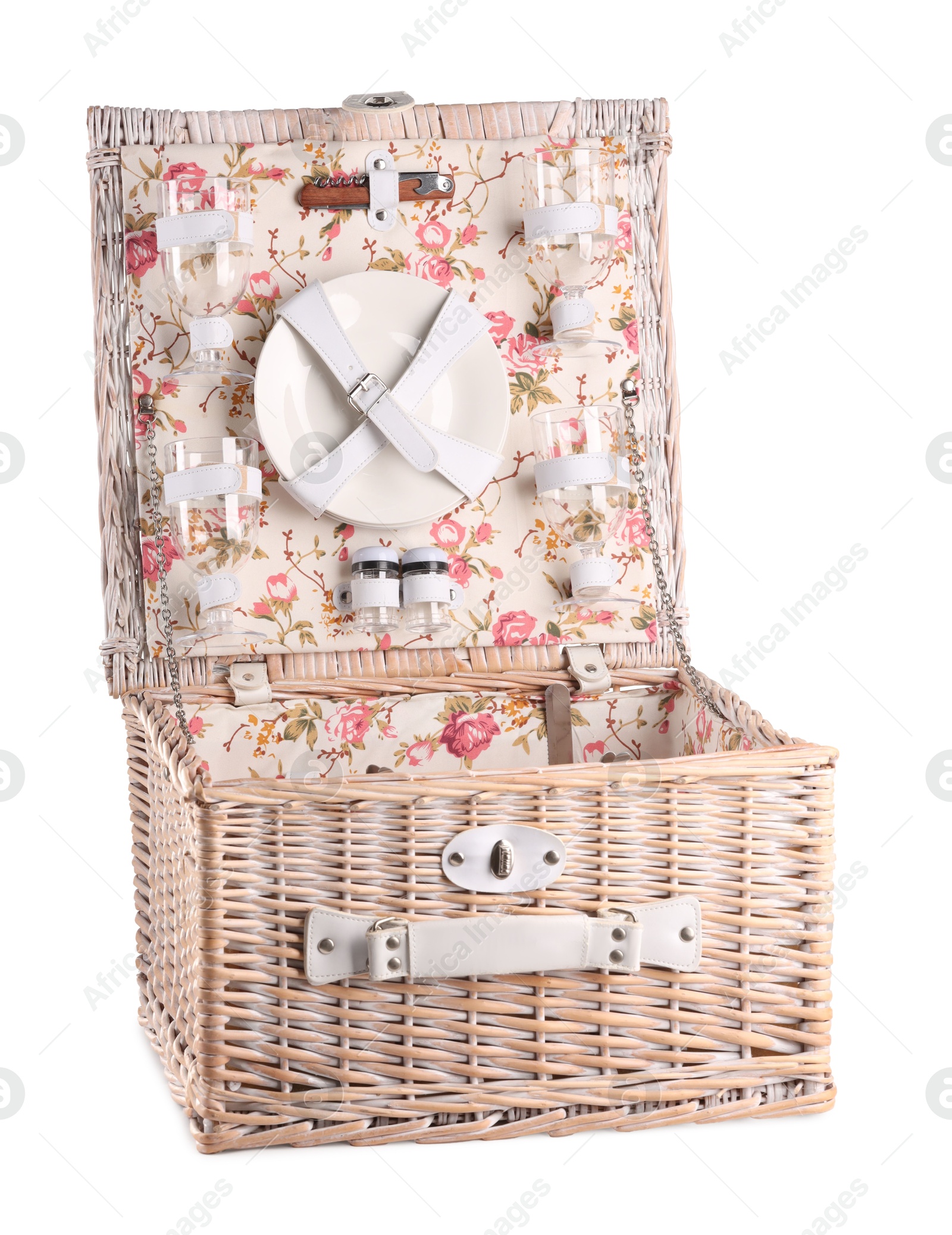 Photo of One open picnic basket with tableware isolated on white