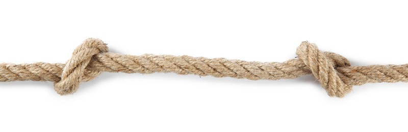 Photo of Hemp rope with knots isolated on white, top view