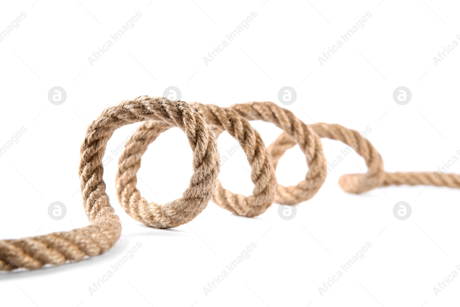 Photo of Hemp rope isolated on white. Organic material