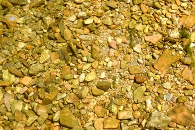 Beautiful mountain river with transparent water as background, top view