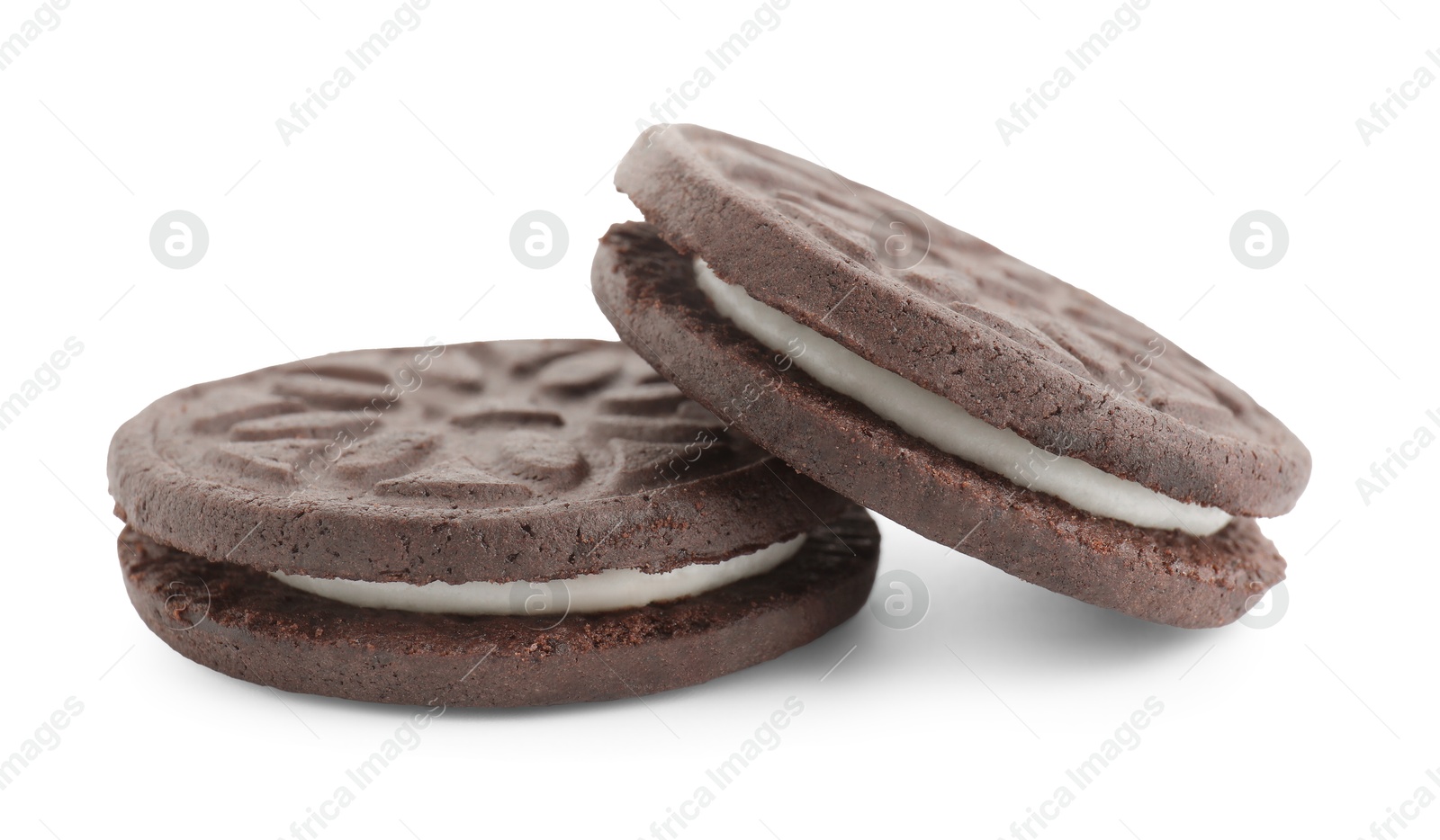 Photo of Two tasty sandwich cookies isolated on white