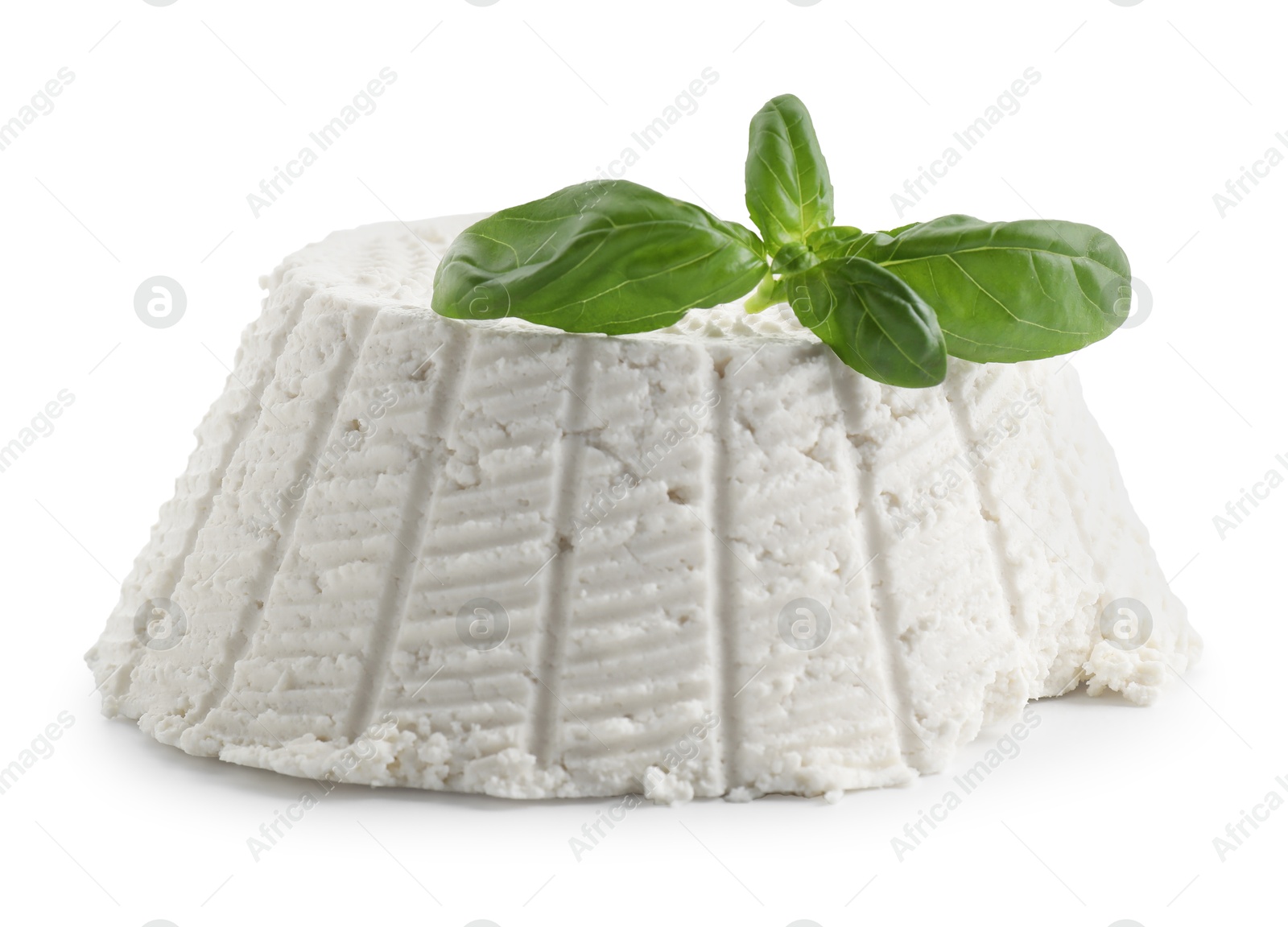 Photo of Tasty ricotta (cream cheese) and basil isolated on white