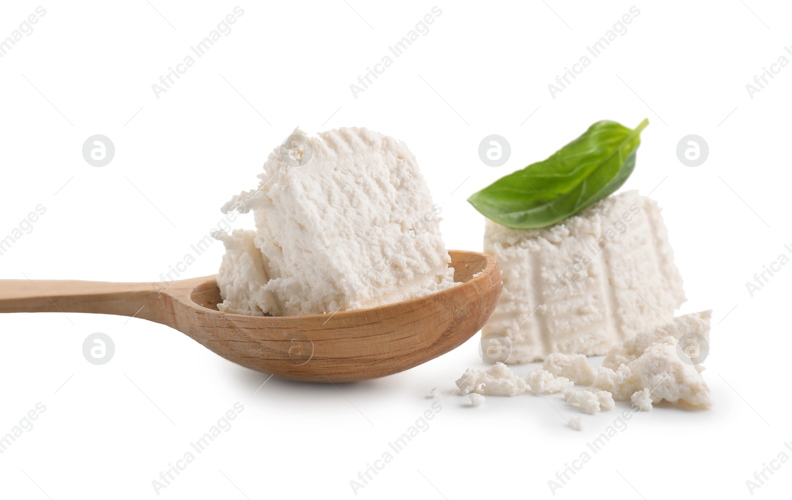 Photo of Tasty ricotta (cream cheese) in spoon isolated on white